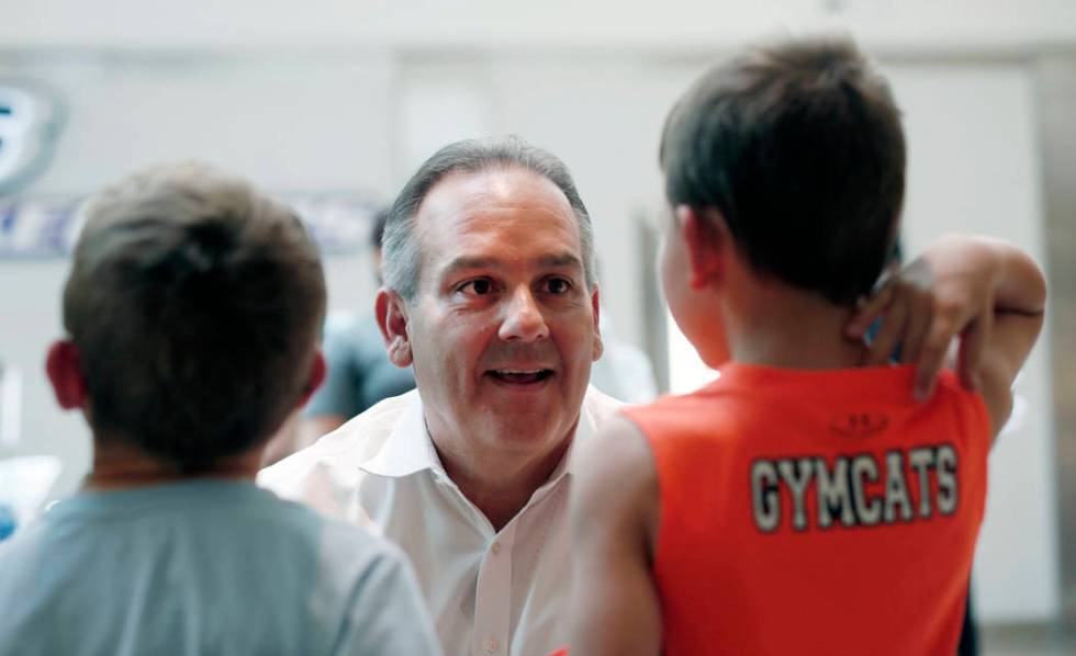 Clark County School District Superintendent Jesus Jara speaks with students going into the firs ...