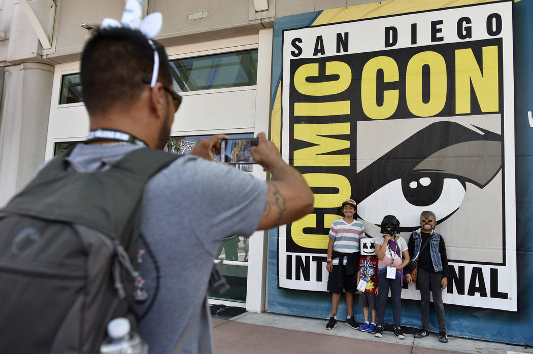 FILE - In this Wednesday, July 18, 2018, file photo, Luis Ramos, left, of San Diego takes a pic ...