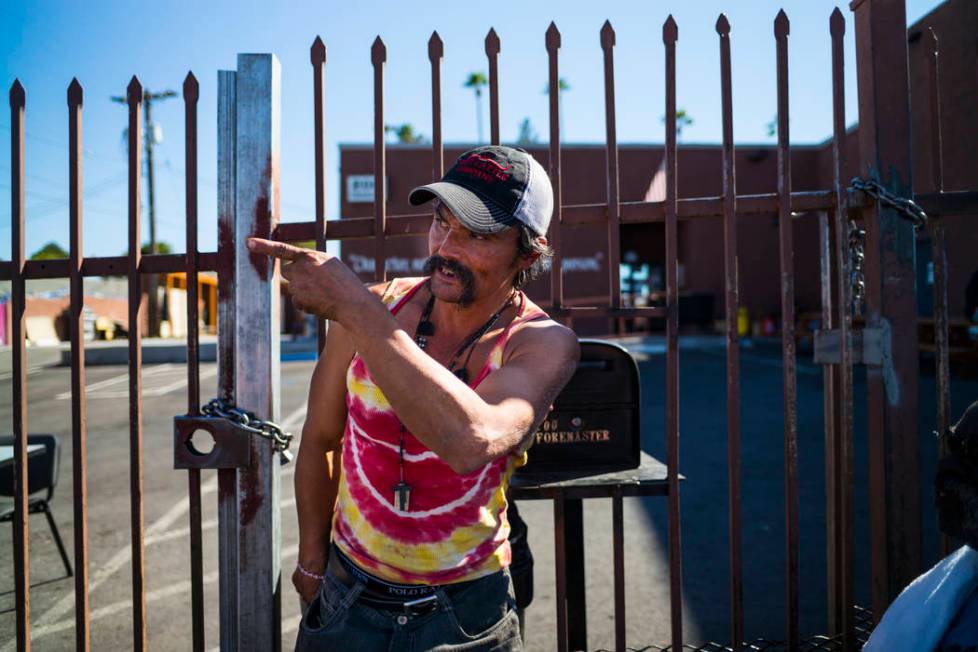 John Bell talks about living homeless while waiting in line for food on Foremaster Lane near do ...