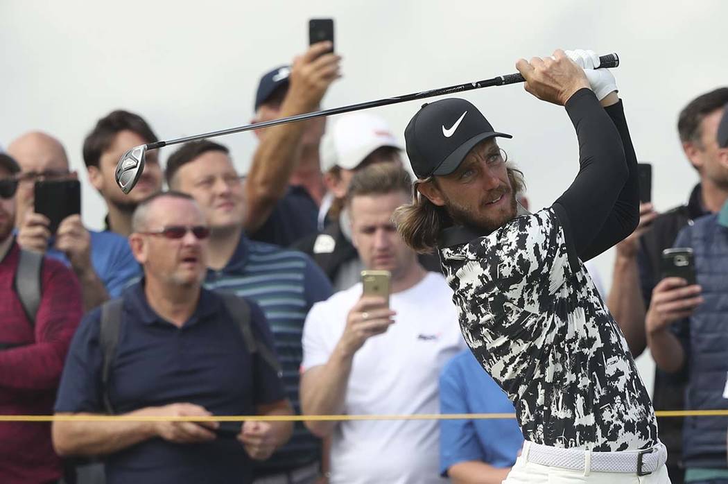 England's Tommy Fleetwood plays his tee shot on the 9th hole during the second round of the Bri ...