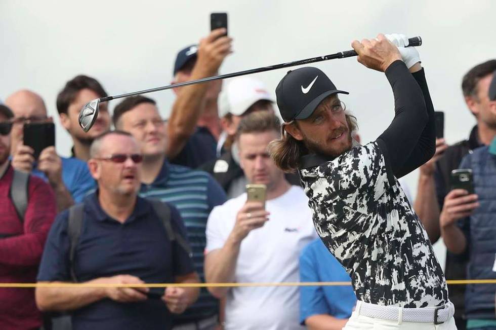 England's Tommy Fleetwood plays his tee shot on the 9th hole during the second round of the Bri ...