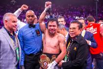 Manny Pacquiao with his belt after defeating Keith Thurman in their WBA super welterweight worl ...
