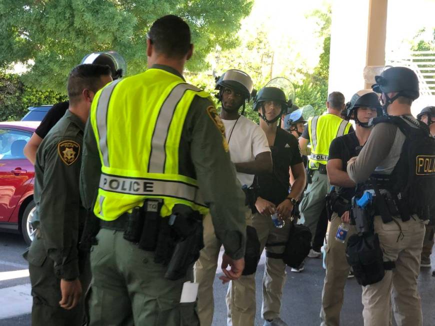 Metropolitan Police Department officers prepare for an active-shooter drill with University Med ...