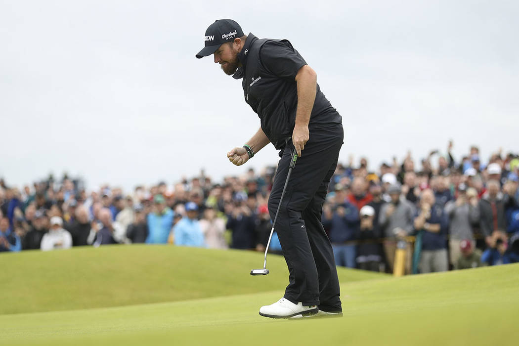 Ireland's Shane Lowry reacts after making a birdie on the 15th green during the final round of ...