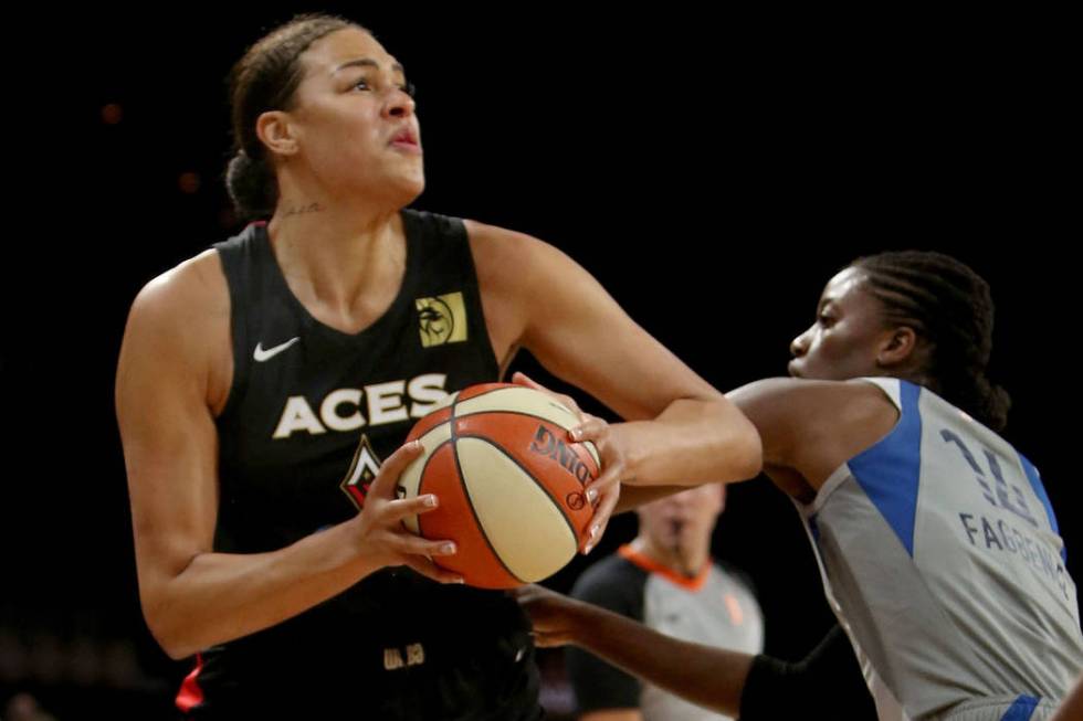 Las Vegas Aces center Liz Cambage (8) attempts a three pointer against Minnesota Lynx center Te ...