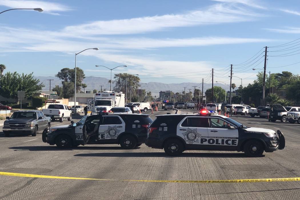 Metropolitan Police Department vehicles at a barricade situation in the 5400 block of South Mar ...
