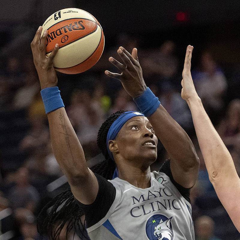 Minnesota Lynx Sylvia Fowles goes to the basket while being defended against by the Washington ...