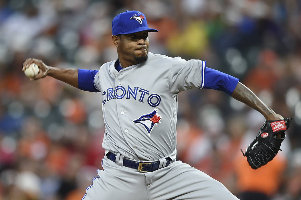 Toronto Blue Jays pitcher Edwin Jackson delivers against the Baltimore Orioles during the third ...