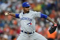 Toronto Blue Jays pitcher Edwin Jackson delivers against the Baltimore Orioles during the third ...