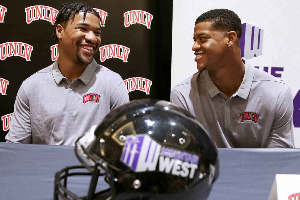 UNLV quarterback Armani Rogers, left, and linebacker Javin White talk to reporters during Mount ...