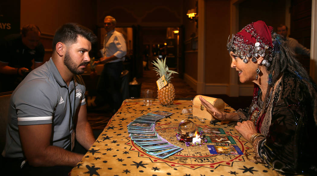 Nevada Linebacker Lucas Weber gets a reading from Samina "Samina Ocean" Pitrello duri ...