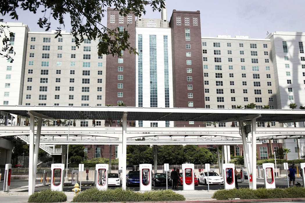 Teslas charge at Tesla's largest Supercharger station now open near the High Roller in Las Vega ...