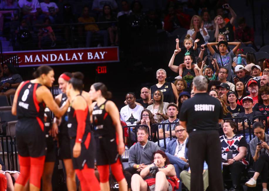 A Las Vegas Aces fans react during the second half of a WNBA basketball game against Seattle St ...
