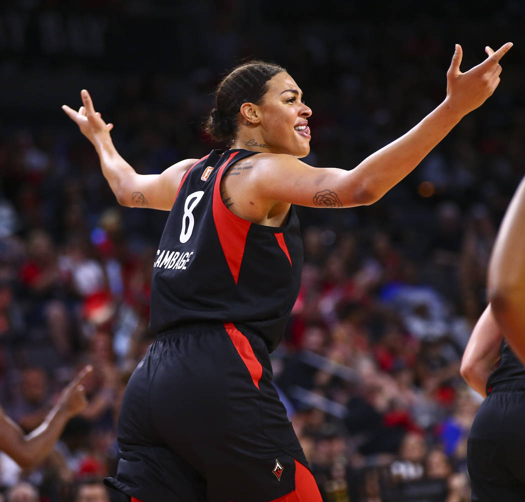 Las Vegas Aces' Liz Cambage celebrates after scoring against Seattle Storm during the second ha ...