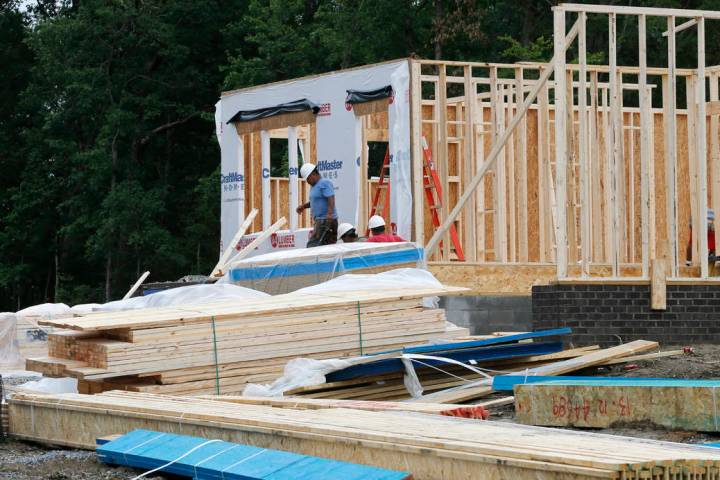 In this June 13, 2019, photo construction continues on a new home in Mechanicsville, Va. On Wed ...