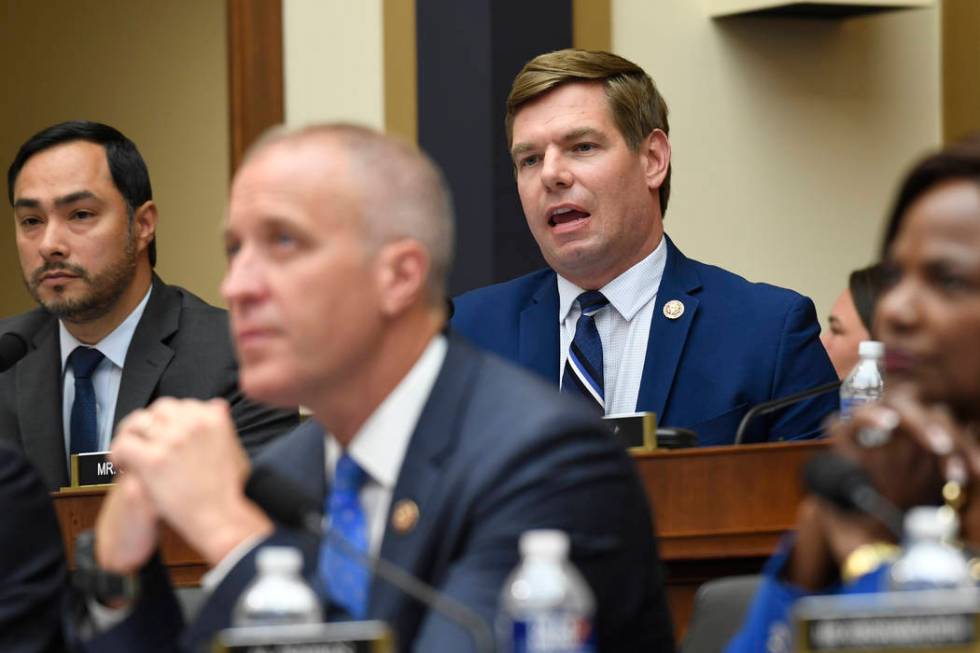 Rep. Eric Swalwell, D-Calif., top center, questions former special counsel Robert Mueller as he ...