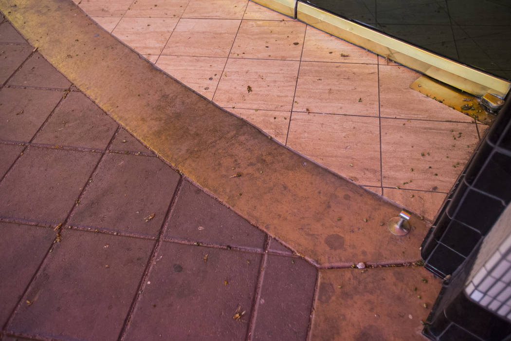 Grasshoppers, some of them dead, are seen outside of the California Hotel in downtown Las Vegas ...