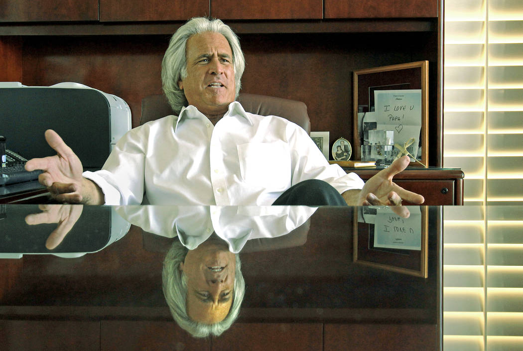 Las Vegas Valley attorney Bob Massi talks about his experiences as he sits behind his desk in h ...