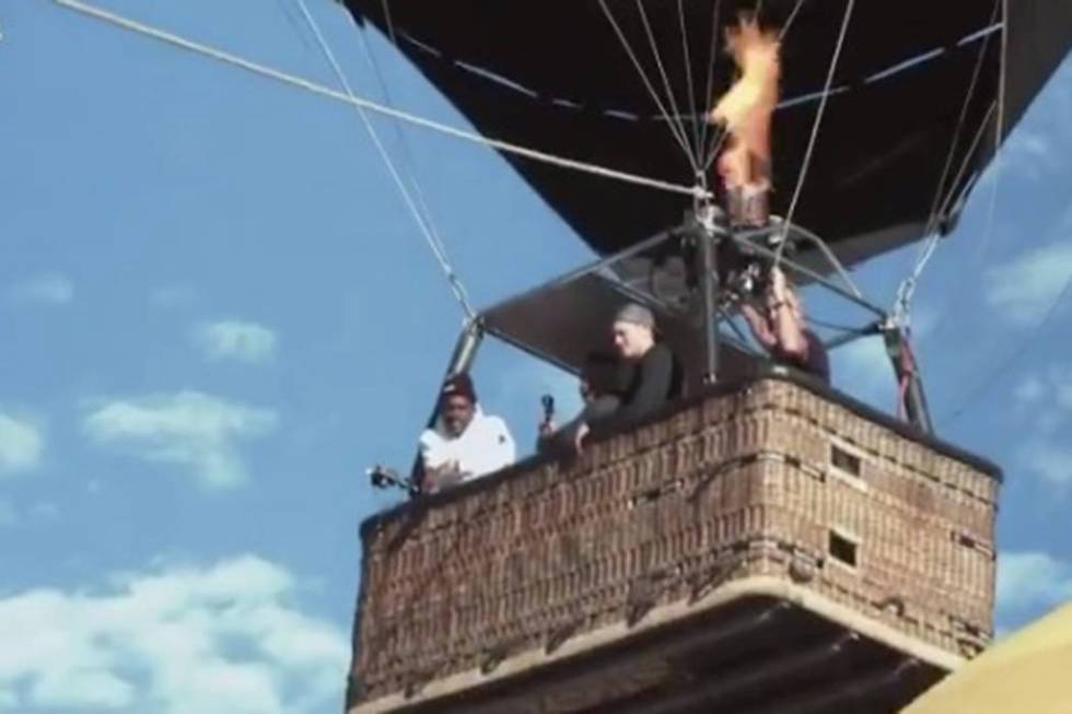 Raiders WR Antonio Brown arrives to the first day of Raiders training camp in a hot air balloon ...