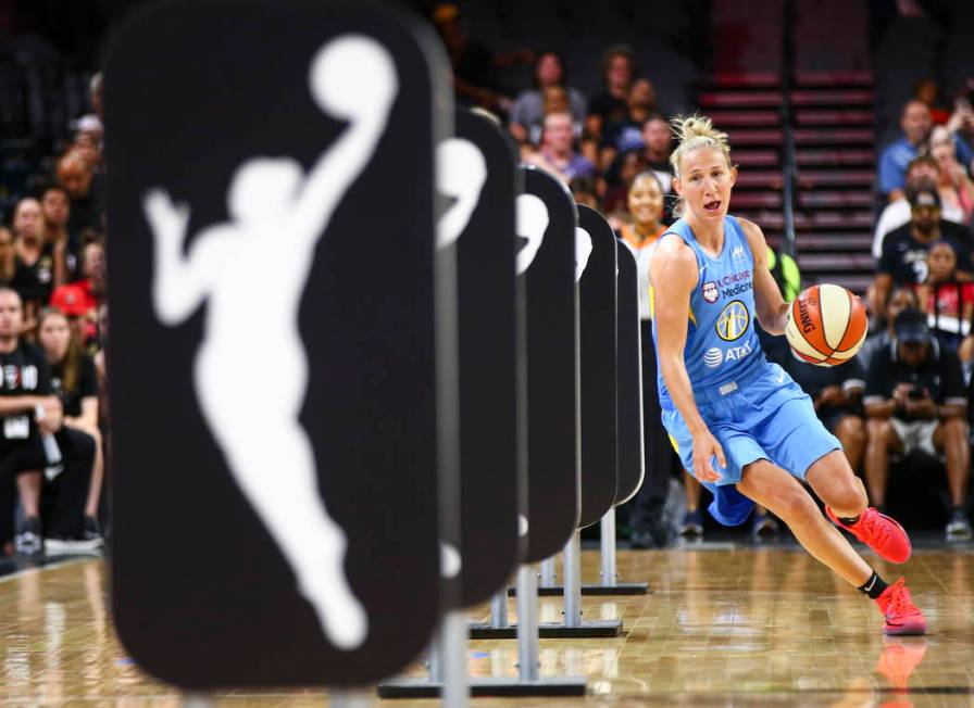 Chicago Sky's Courtney Vandersloot competes in an obstacle course involving passing and shootin ...