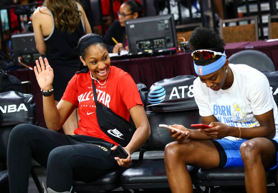 Las Vegas Aces' A'ja Wilson, left, shares a laugh with Chicago Sky's Diamond DeShields competes ...