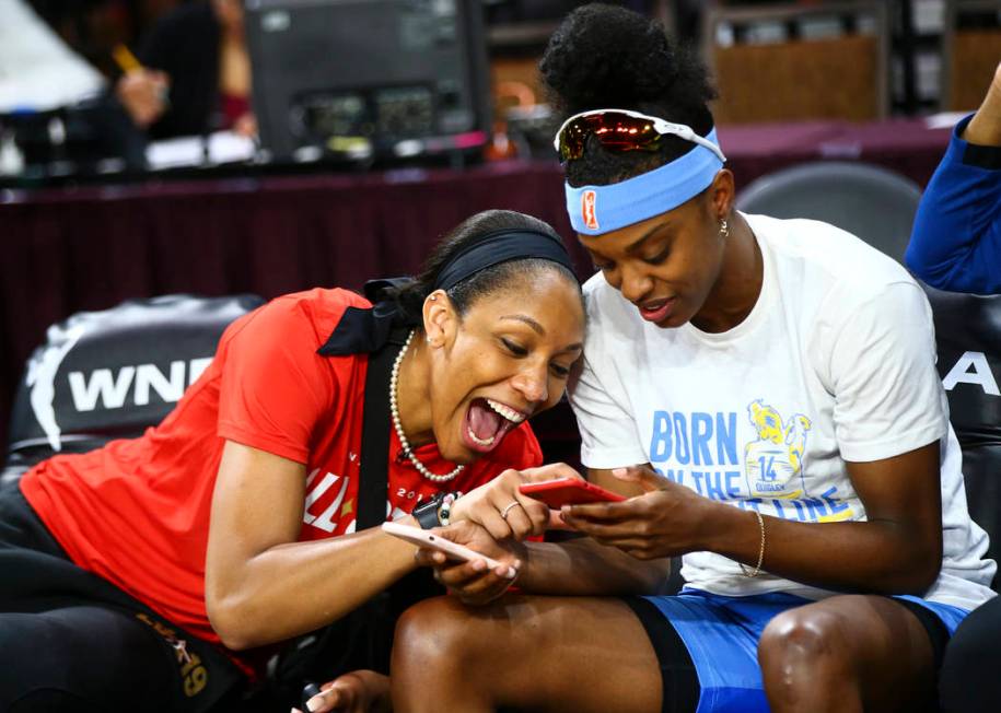 Las Vegas Aces' A'ja Wilson, left, shares a laugh with Chicago Sky's Diamond DeShields competes ...