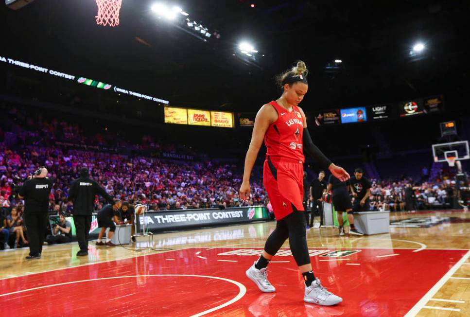 Las Vegas Aces' Kayla McBride prepares to compete in the final round of the three-point shootin ...