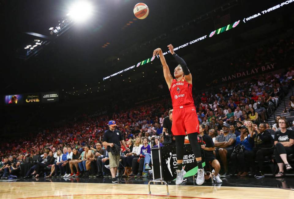 Las Vegas Aces' Kayla McBride competes in the three-point shooting challenge during the WNBA Al ...