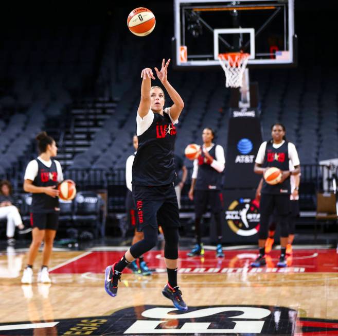 Washington Mystics' Elena Delle Donne shoots to score a half-court shot during practice ahead o ...