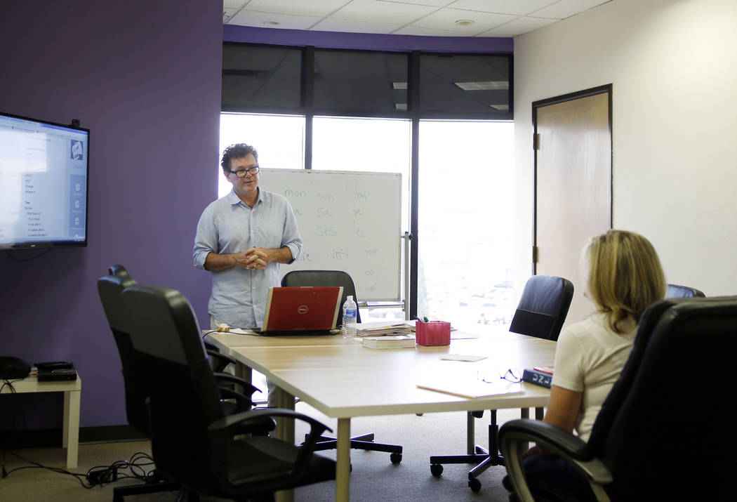 Instructor Lionel Huddlestone explains the months of the year in French during a beginners Fren ...