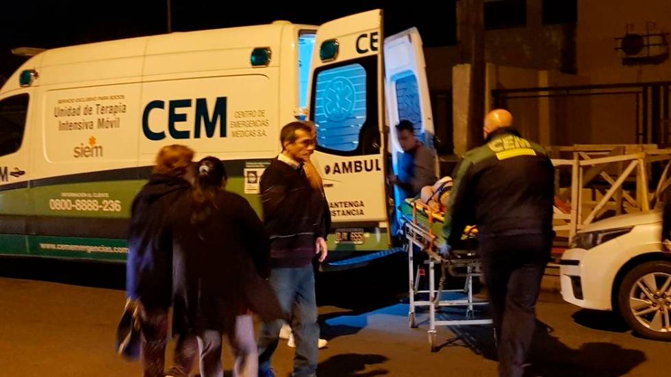 Argentine boxer Hugo Santillan is placed on an ambulance after he collapsed at the end of a WBC ...