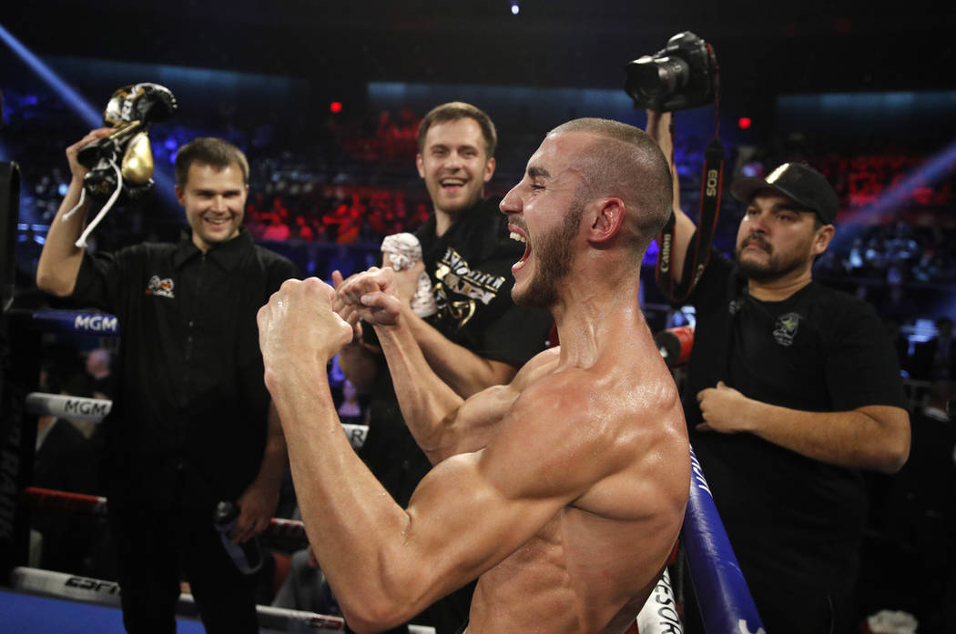 Maxim Dadashev celebrates after defeating Antonio DeMarco during a junior welterweight bout in ...