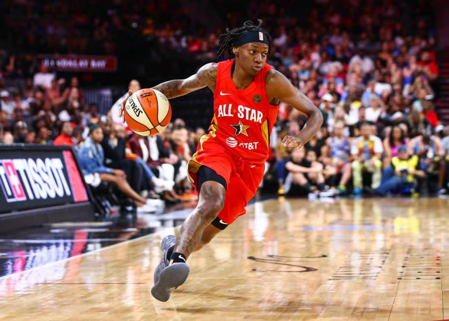 Indiana Fever's Erica Wheeler drives to the basket during the second half of the WNBA All-Star ...