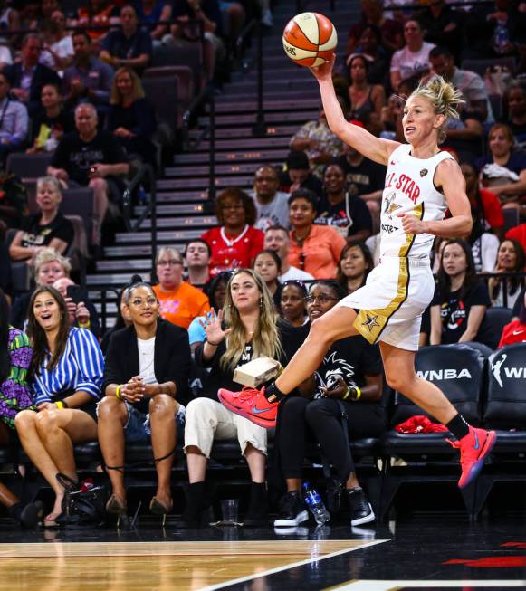 Chicago Sky's Courtney Vandersloot jumps to keep the ball in during the second half of the WNBA ...