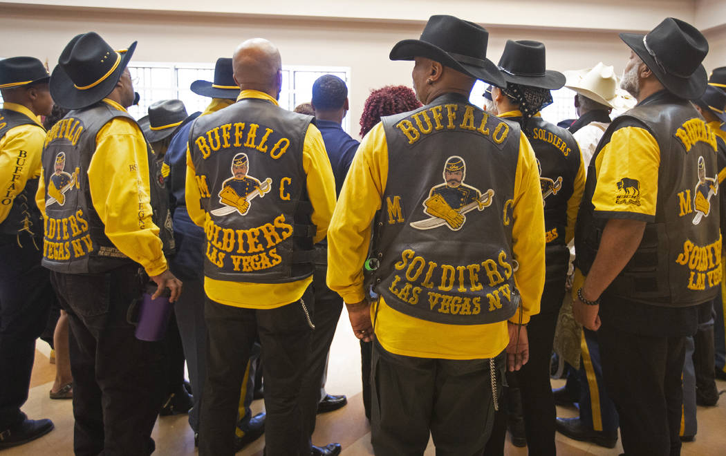 Buffalo Soldiers Motorcycle Club members wait to take a group picture during Buffalo Soldiers D ...