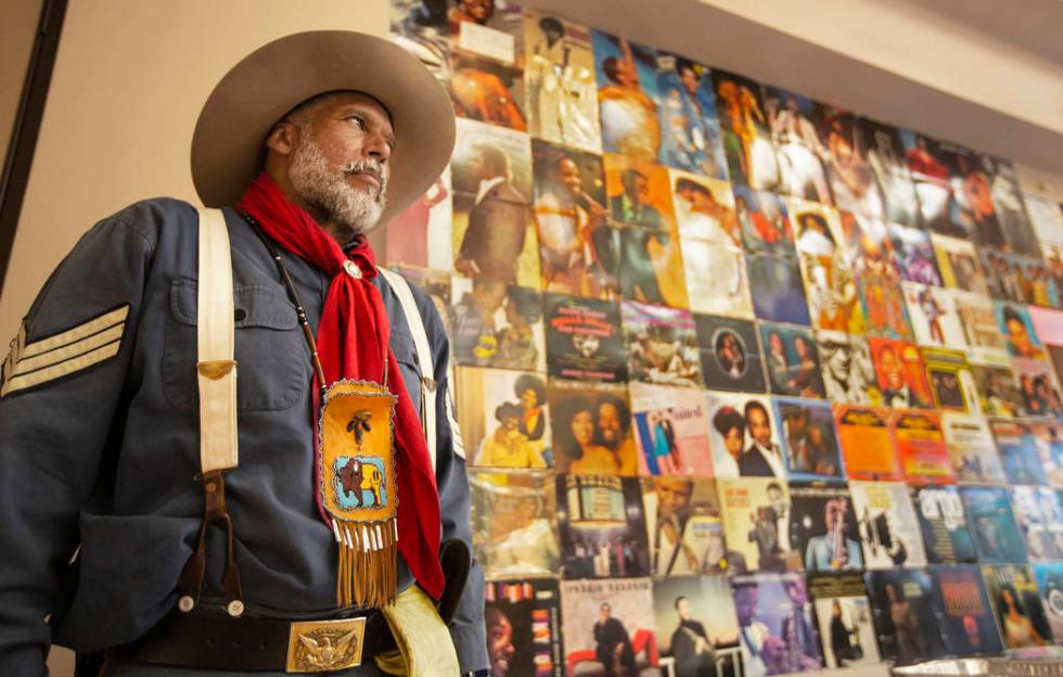 Keith Hill, president trooper of the 9th and 10th Horse Cavalry Association, waits to accept a ...