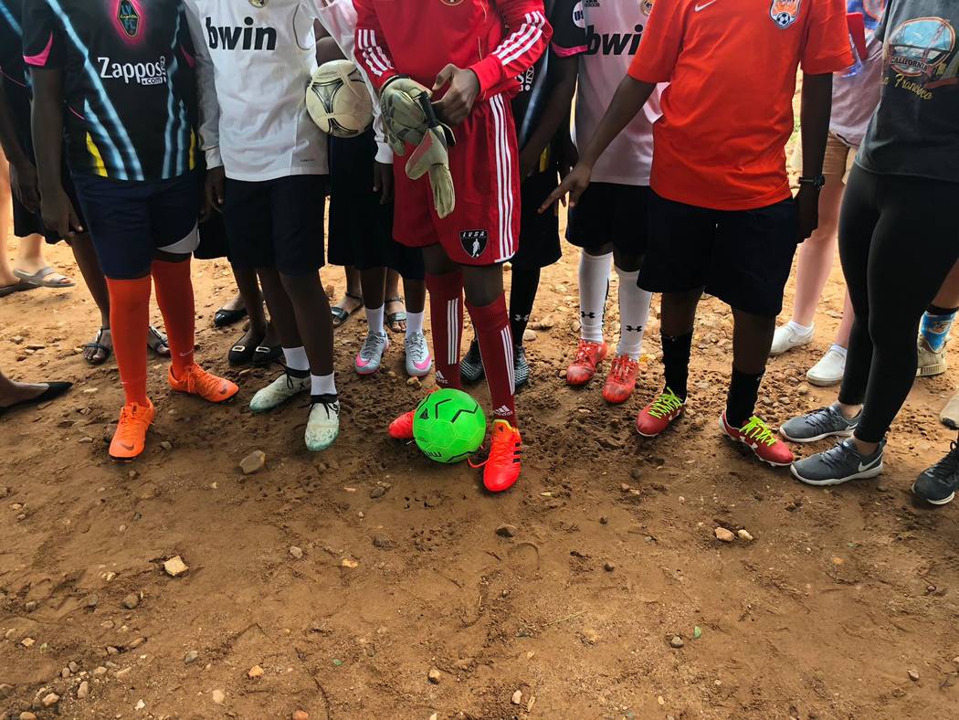 Students at the Kabore School in Ho, Volta Region, Ghana, prepare for a soccer match after Ligh ...