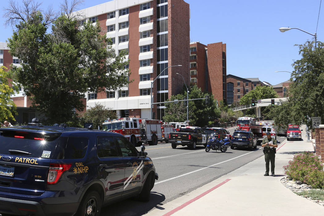 Rescue personnel respond to an explosion that damaged Argenta and Nye Halls on the University o ...