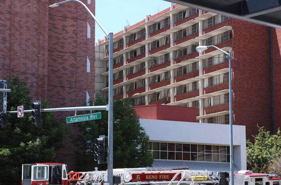 Rescue personnel respond to an explosion that damaged Argenta Hall and Nye Hall on the Universi ...