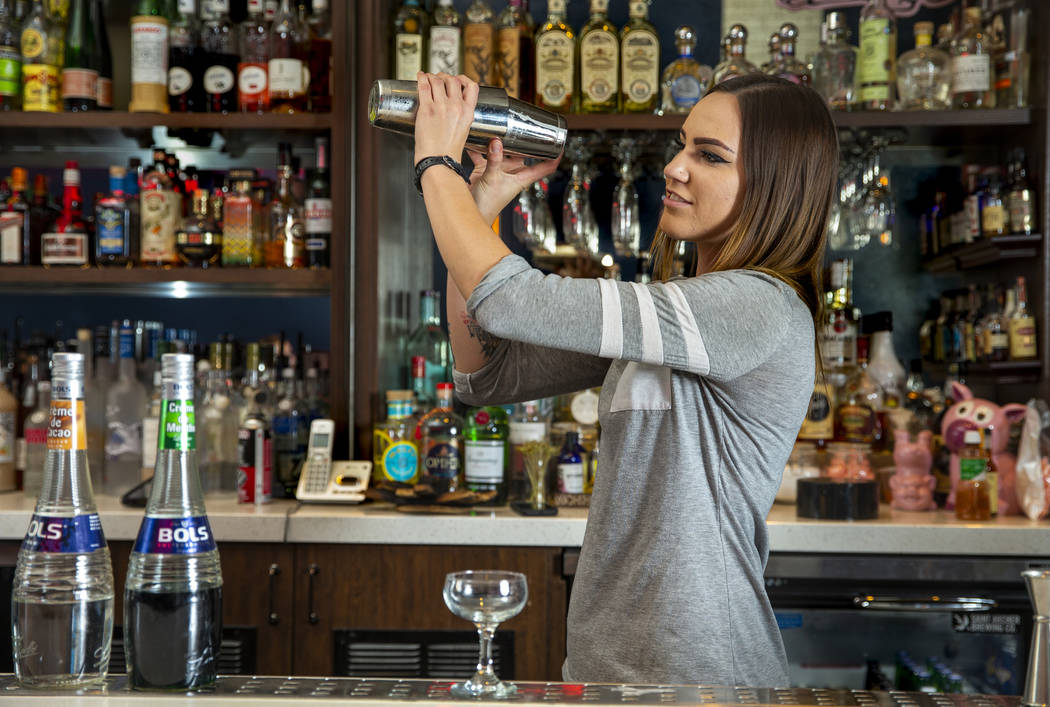 Bartender Sarah Contois at the Smashed Pig prepares a grasshopper drink on Sunday, July 27, 201 ...