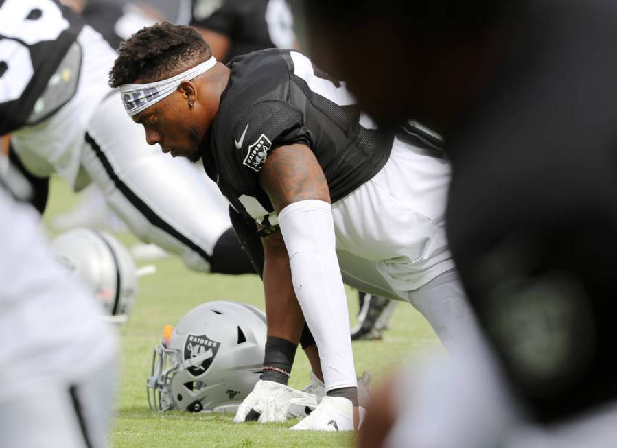 Oakland Raiders inside linebacker Brandon Marshall (54) stretches during the NFL team's trainin ...