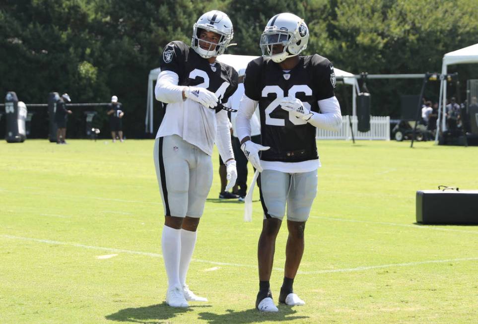 Oakland Raiders safety Johnathan Abram (24) and Oakland Raiders cornerback Nevin Lawson (26) wo ...