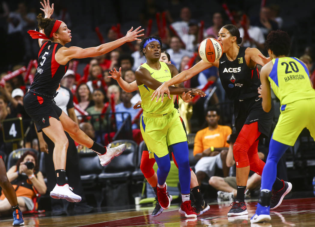 Las Vegas Aces' Dearica Hamby, left, and Las Vegas Aces' Liz Cambage, center right, guard Dalla ...