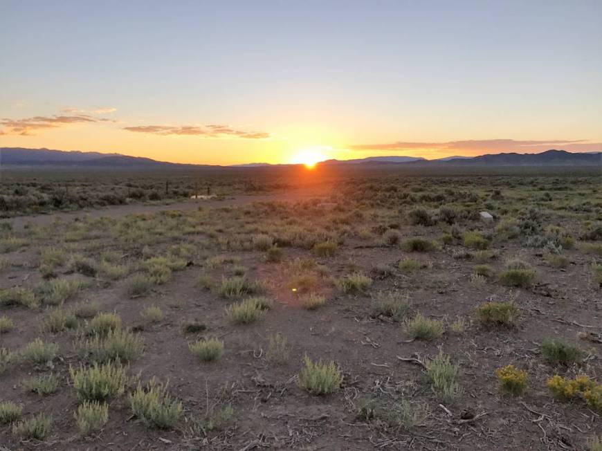 The sun rises over terrain where a hunter can typically find pronghorn antelope in the Silver S ...