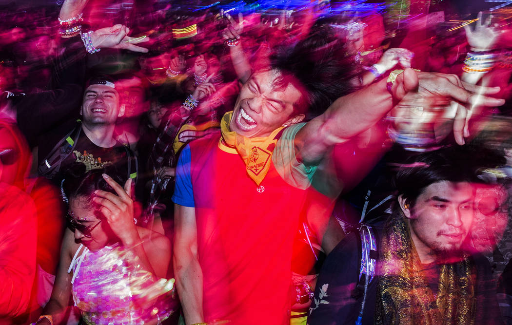 Concert goers dance during SAYMYNAME's performance at the Circuit Grounds stage on day three of ...