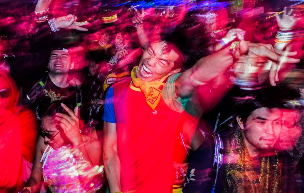 Concert goers dance during SAYMYNAME's performance at the Circuit Grounds stage on day three of ...