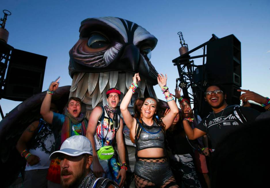 Attendees dance at the Wide Awake art car during the first day of the Electric Daisy Carnival a ...