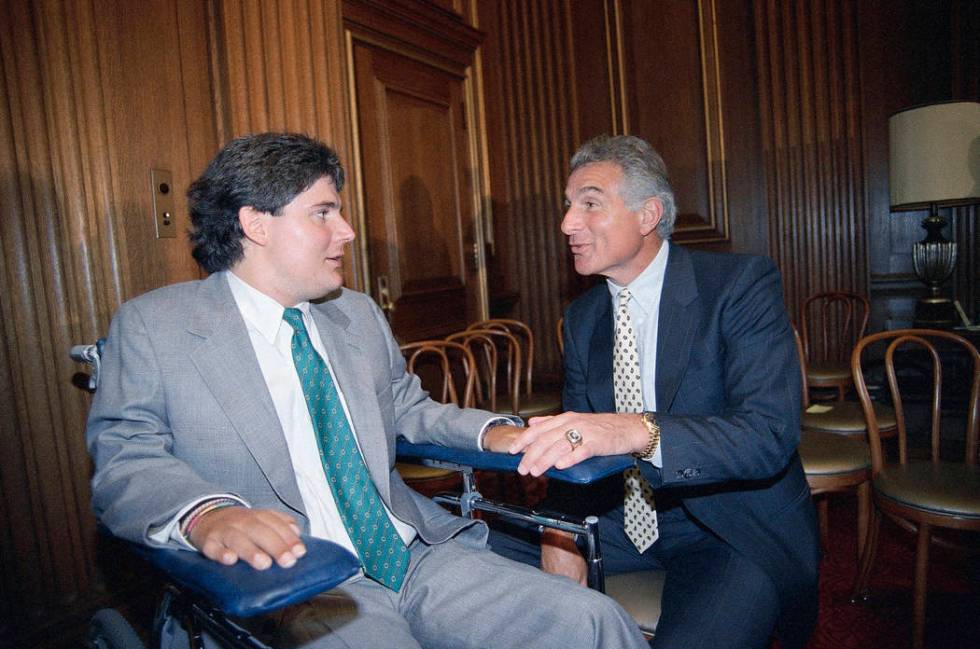 FILE - In this June 28, 1989, file photo, Marc Buoniconti, left, and his father, former Miami D ...