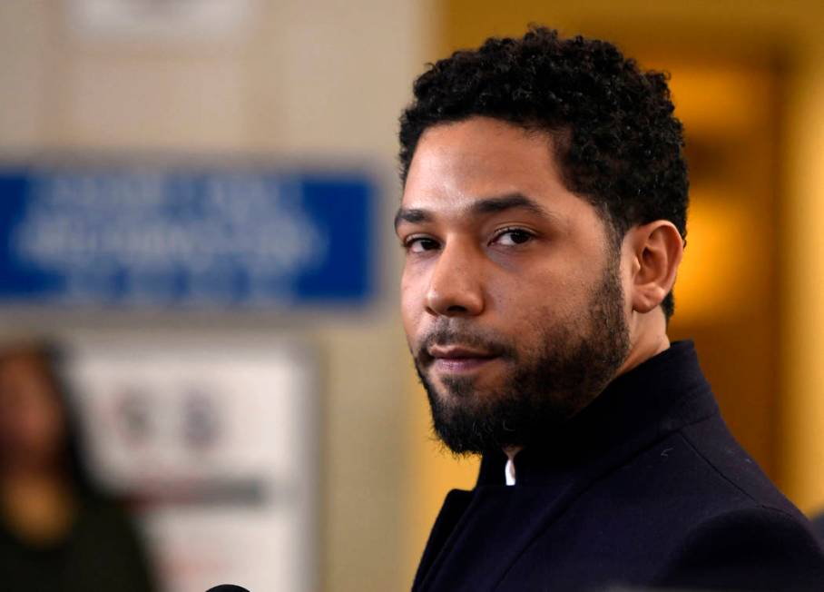 FILE - In this March 26, 2019, file photo, actor Jussie Smollett talks to the media before leav ...