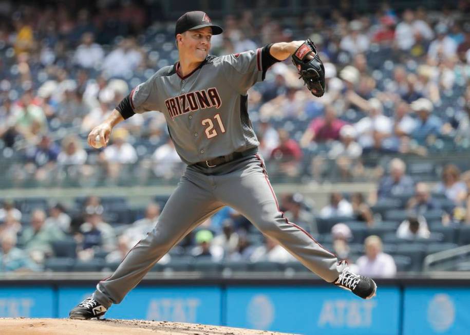 Arizona Diamondbacks' Zack Greinke delivers a pitch during the first inning of a baseball game ...
